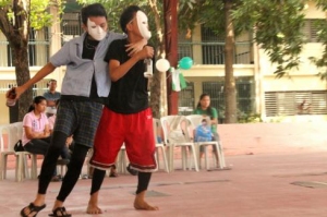 Two boys perform in skit