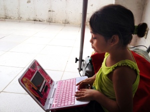 girl with toy computer