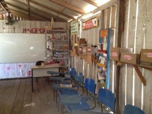 Amazon village classroom with sparse furnishings.