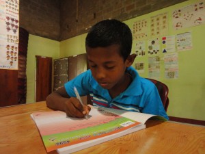 Sri Lanka boy writing